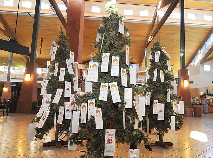 Angel Tree at the mall. Pick a card and buy the gift that the child has asked for. (Les Stukenberg/Courier)