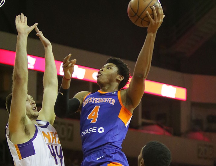 Westchester forward Isaiah Hicks (4) goes up for a shot over Northern Arizona’s Eric Stuteville (44) as the Suns take on the Knicks on Sunday, Dec. 10, 2017, in Prescott Valley. (Matt Hinshaw/NAZ Suns)