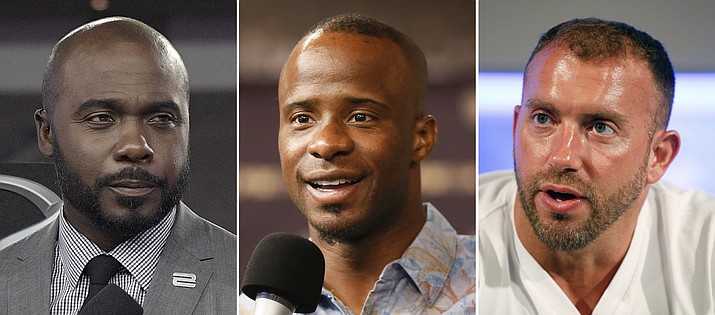 Marshall Faulk (left), Ike Taylor (center) and Heath Evans were suspended after an ex-employee alleged sexual misconduct in a lawsuit. (AP Photo/File)