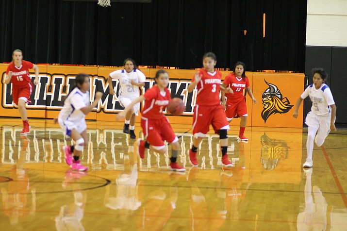 Cayli Miles runs past the defense at the Holiday Classic in Williams Dec. 2.