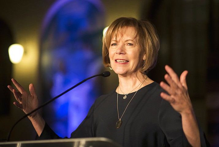 FILE - In this Jan. 10, 2015 file photo, Minnesota Democratic Lt. Gov. Tina Smith speaks to attendees at the North Star Ball in St. Paul, Minn. Minnesota Gov. Mark Dayton is set to name his choice to replace Al Franken in the U.S. Senate, with the top contender seen as Lt. Gov. Smith. (Aaron Lavinsky/Star Tribune via AP, File)