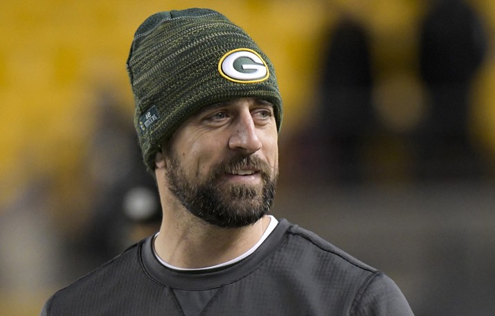In this Nov. 26, 2017, photo, Green Bay Packers quarterback Aaron Rodgers watches warmups before a game against the Pittsburgh Steelers. (Don Wright/AP, File)