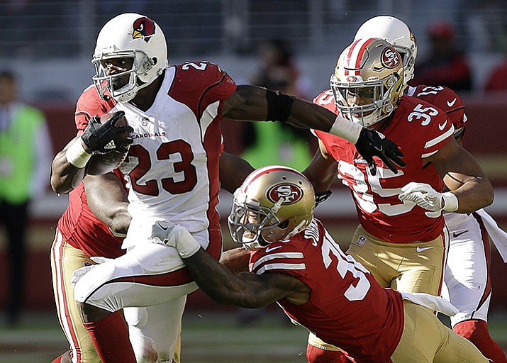 In this Sunday, Nov. 5, 2017, file photo, Arizona Cardinals running back Adrian Peterson (23) runs against the San Francisco 49ers during the first half of an NFL football game in Santa Clara, Calif. Adrian Peterson was placed on injured reserve Friday, Dec. 15, 2017, because of a neck injury, ending the running back’s season after only six games with the Arizona Cardinals. 