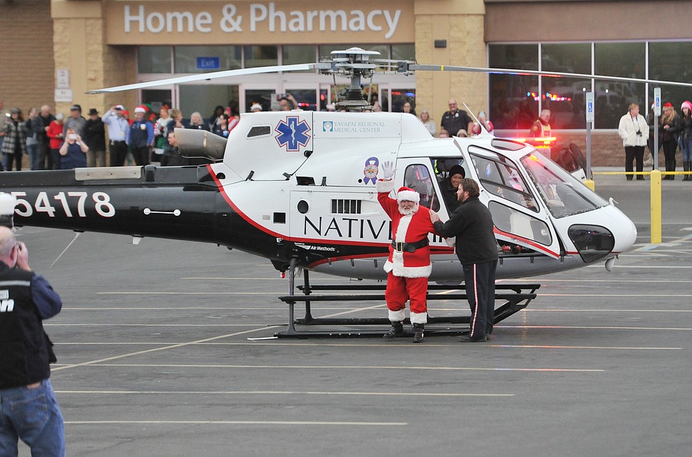 Shop with a Cop held their annual shopping spree for 115 children at the Walmart on Gail Gardner Way in Prescott Saturday morning. Officers from 12 local agencies took the children with $250 to spend shopping, then a breakfast, visit with Santa and a ride in their patrol vehicles. (Les Stukenberg/Courier)