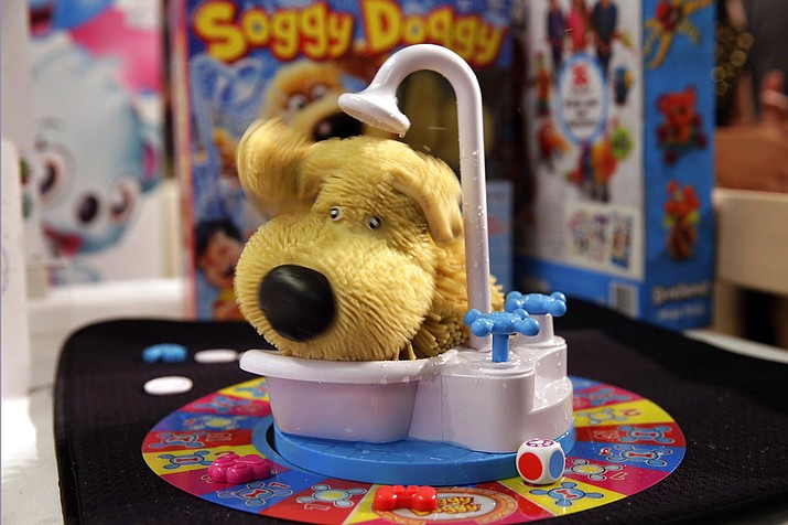 This Tuesday, Sept. 26, 2017, photo shows the Soggy Doggy game from Ideal on display at the 2017 TTPM Holiday Showcase in New York. Soggy Doggy, by toymaker Spin Master, features a plastic dog in a bathtub that shakes water on players. (AP Photo/Richard Drew)
