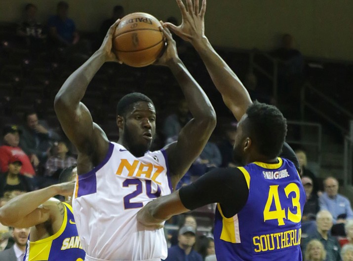 Northern Arizona's Anthony Bennett looks for the open man against a Santa Cruz defender Dec. 12, 2017, in Prescott Valley. Bennett scored 21 points in a 103-87 loss to the Oklahoma City Blue on Tuesday, Dec. 19, 2017, in Oklahoma City. (Matt Hinshaw/NAZ Suns, File)
