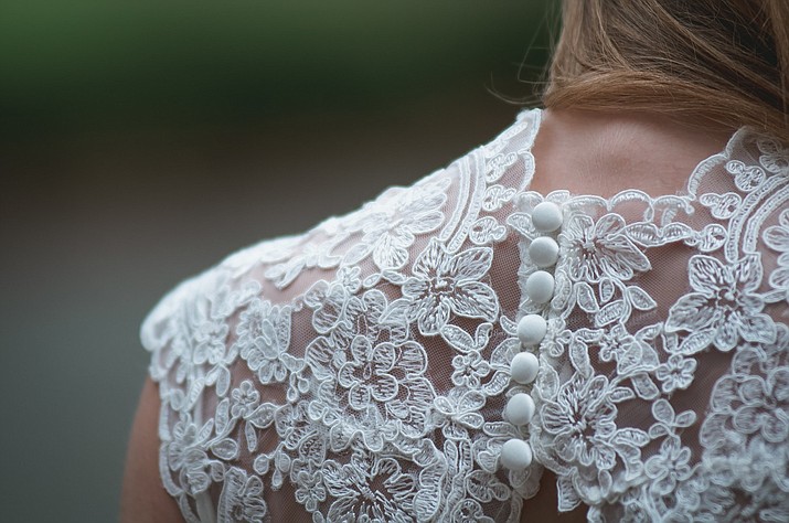 Firefighters helped save a woman’s wedding dress from a burning home in Massachusetts. (Brandon Morgan, Unsplash)
