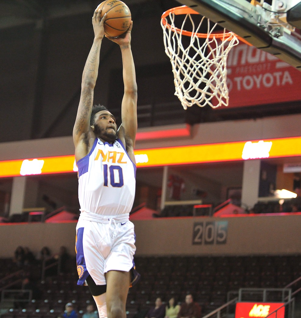 Northern Arizona's Derrick Jones Jr. goes high for two points as the Suns take on the Oklahoma City Blue Friday night at the Prescott Valley Event Center.  (Les Stukenberg/Courier)