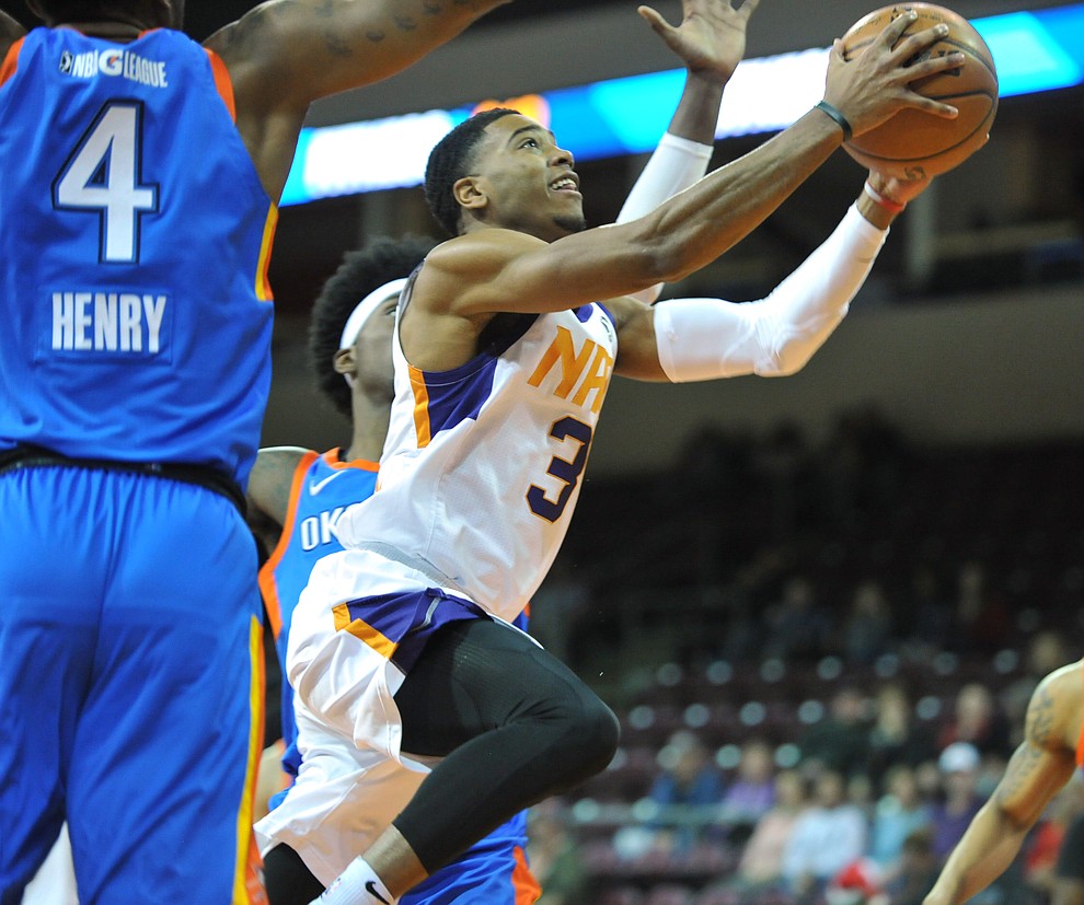 Northern Arizona's Shaquille Harrison gets through the defense as the Suns take on the Oklahoma City Blue Friday night at the Prescott Valley Event Center.  (Les Stukenberg/Courier)