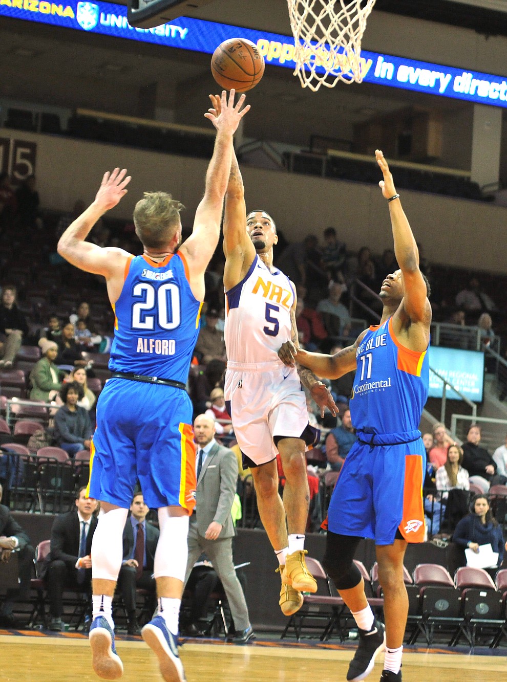 Northern Arizona's Josh Gray gets a finger roll to fall as the Suns take on the Oklahoma City Blue Friday night at the Prescott Valley Event Center.  (Les Stukenberg/Courier)