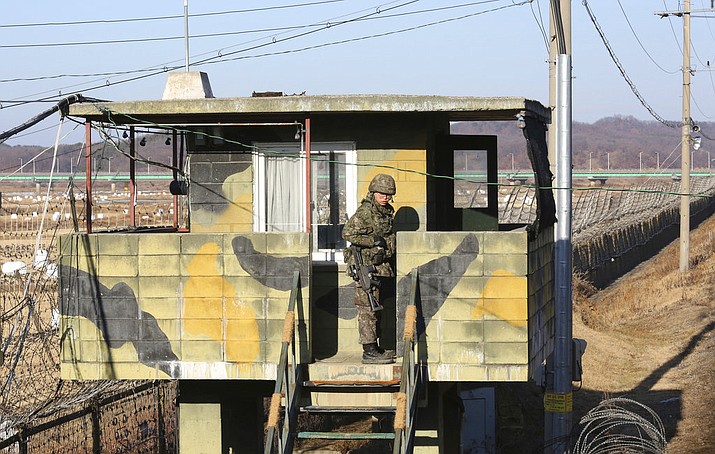 A South Korean army soldier stands guard at a military guard post in Paju, South Korea, near the border with North Korea Monday, Dec. 25, 2017. North Korea on Sunday called the latest U.N. sanctions to target the country "an act of war" that violates its sovereignty, and said it is a "pipe dream" for the United States to think it will give up its nuclear weapons. (AP Photo/Ahn Young-joon)