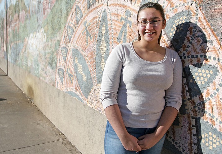 Since August, Mingus Union senior Sofia Rocha has interned at Cottonwood City Hall with Mayor Tim Elinski. The internship is called Return on Investment, and is part of the school’s Gear Up program. Sofia recently began working on a project to update the mural at the Red Rooster Café on Main Street. (Photo by Bill Helm)
