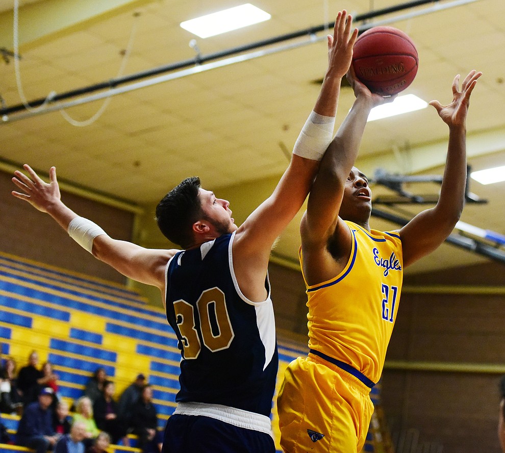 Embry Riddle's Joseph Jewell goes hard to the hoop as the Eagles take on the University of California Merced Thursday, January 5 in Prescott. (Les Stukenberg/The Daily Courier)
