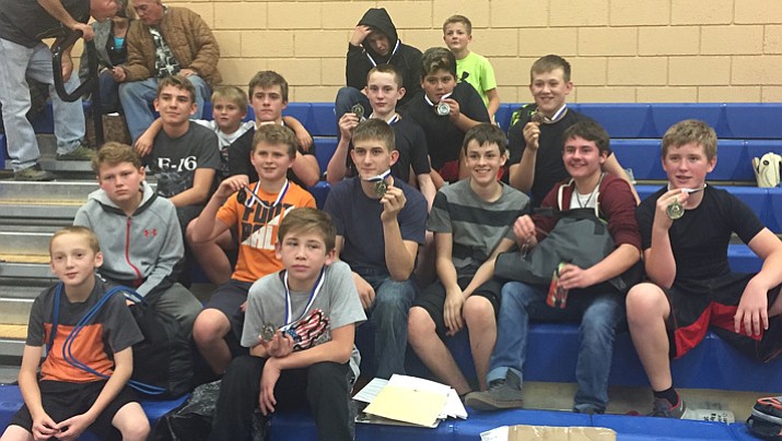 Members of the Humboldt Unified School District middle school wrestling team pose for a photo after competing with six other teams at a dual in Camp Verde on Nov. 30. (HUSD/Courtesy)