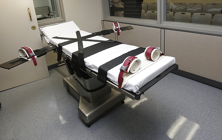 FILE - This file photo shows the gurney in the execution chamber at the Oklahoma State Penitentiary in McAlester, Okla.  (AP Photo/Sue Ogrocki, File)

