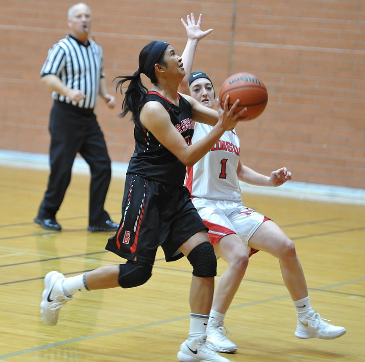 Bradshaw Mountain's Jesycca Cambalon drives to the basket as the Bears take on the Mingus Marauders in the Prescott Winter Classic girls basketball tournament in Prescott Friday morning.  (Les Stukenberg/Courier)