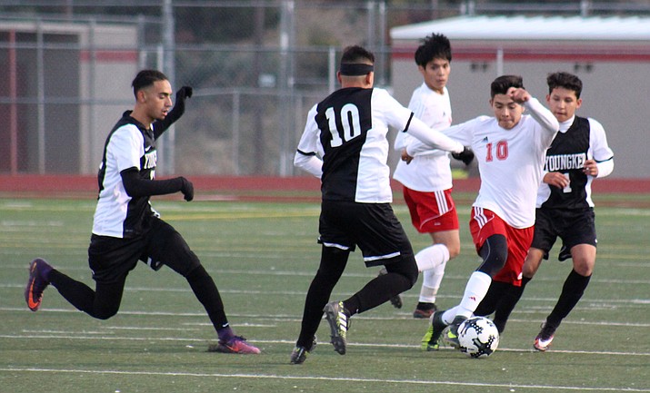 Mingus senior Cristian Sandoval dribbles throw a pack of Youngker players. The Marauders return from winter break on Friday when they host Lee Williams at 5 p.m. (VVN/James Kelley)