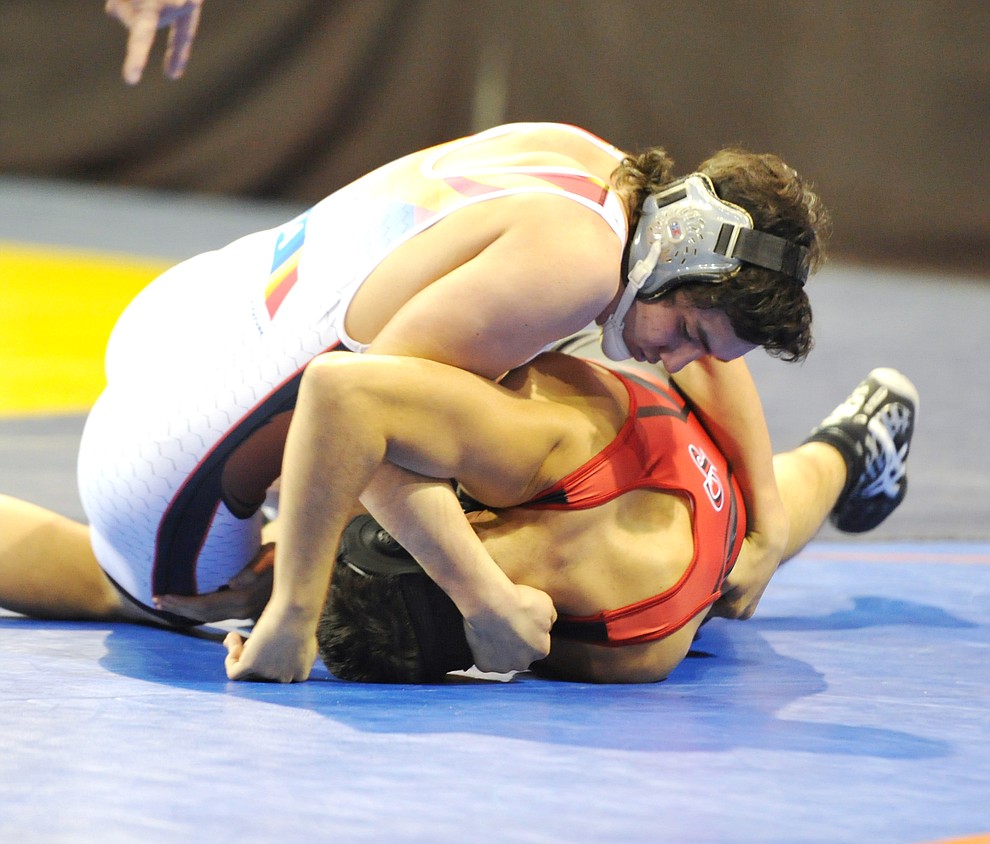 Bradshaw Mountain's Daniel Medevielle defeated Chandler's Brandon Carmona in the opening round of the Mile High Challenge Wrestling Tournament at the Prescott Valley Event Center Friday morning.  (Les Stukenberg/Courier)