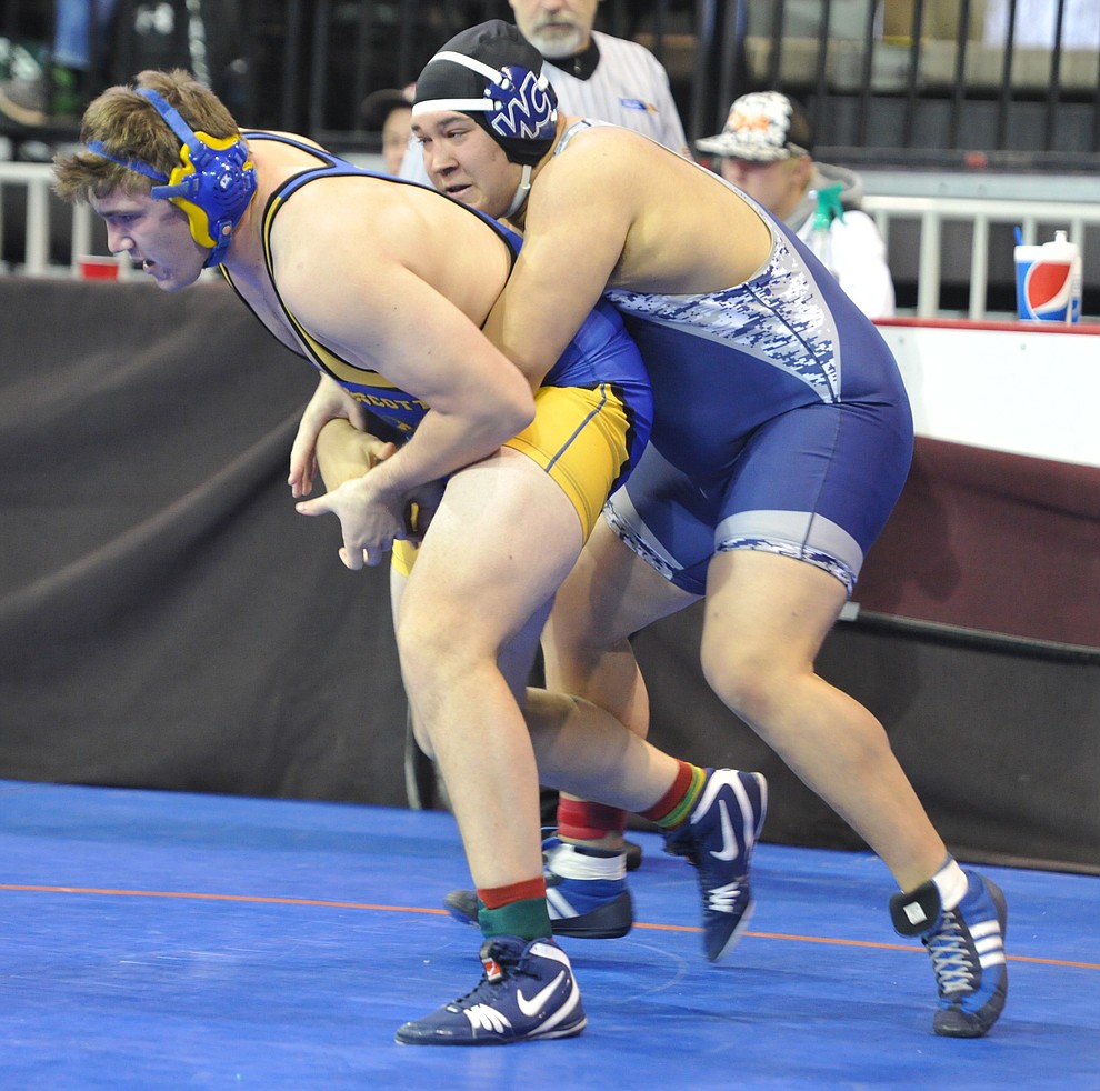 Prescott's Gavin Nelson beats Willow Canyon's Mathew McLure to advance to the championship match in the heavyweight division of the Mile High Challenge at the Prescott Valley Event Center Saturday afternoon. (Les Stukenberg/Courier)