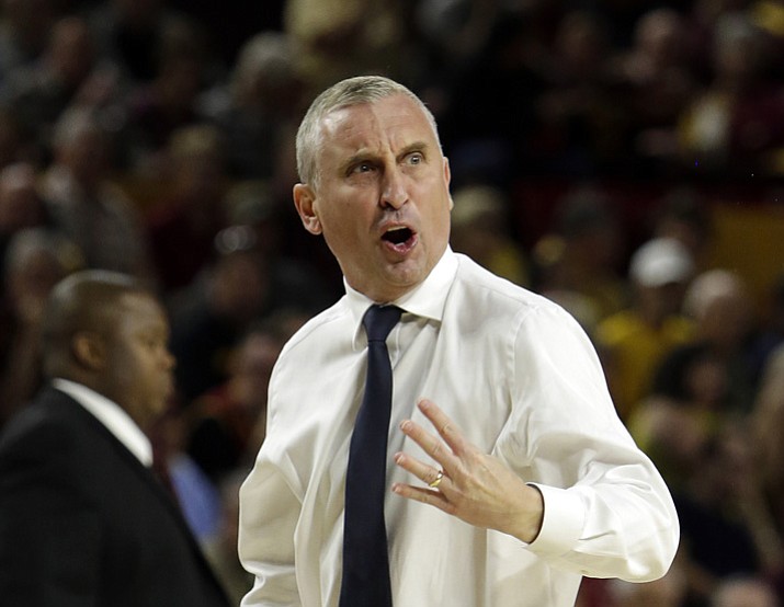 This Dec. 17, 2017, file photo shows Arizona State head coach Bobby Hurley reacting to a foul call in the first half during an NCAA college basketball game against Vanderbilt,  in Tempe, Ariz.  Arizona is home to the two biggest surprises in the Pac-12. No. 3 Arizona State was picked to finish sixth in the conference, but has turned out to be one of the nation's best teams. No. 17 Arizona dropped out of the AP Top 25 from No. 2 after an 0-3 trip to the Bahamas before moving back into the poll. (Rick Scuteri/AP, File)
