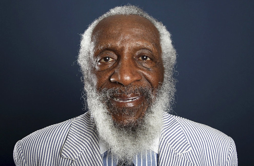 FILE - In this July 21, 2012 file photo, comedian and activist Dick Gregory poses for a portrait during the PBS TCA Press Tour in Beverly Hills, Calif. Gregory, the comedian and activist and who broke racial barriers in the 1960s and used his humor to spread messages of social justice and nutritional health, has died. He was 84. Gregory died late Saturday, Aug. 19, 2017, in Washington, D.C. after being hospitalized for about a week, his son Christian Gregory told The Associated Press. He had suffered a severe bacterial infection. (Photo by Matt Sayles/Invision/AP, File)