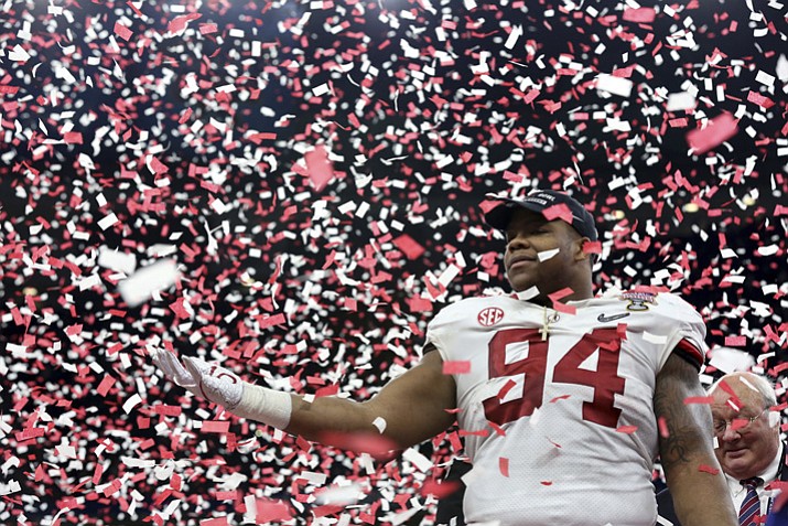 Alabama defensive lineman Da’Ron Payne (94) celebrates after being selected most valuable defensive player, after the Sugar Bowl semi-final playoff game against Clemson on Monday, Jan. 1, 2018, in New Orleans. Alabama won 24-6 to advance to the national championship game. (Rusty Costanza/AP)