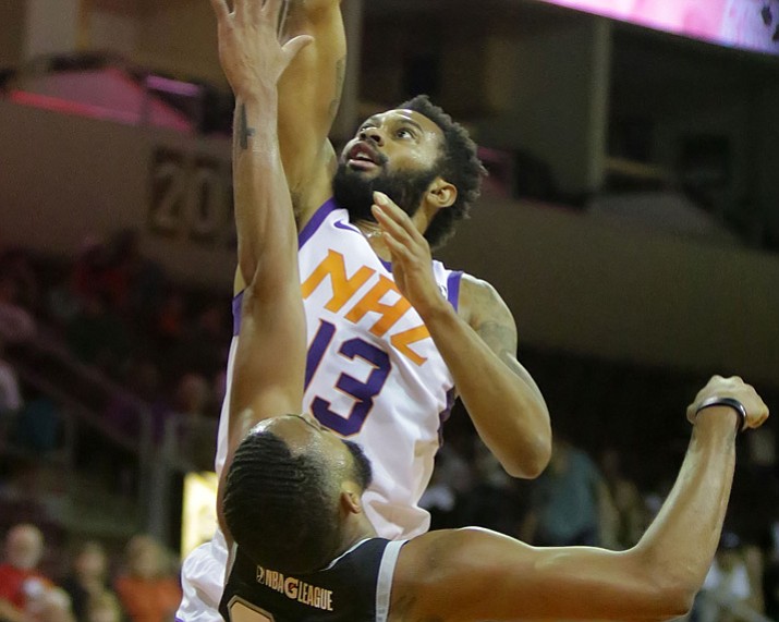 Xavier Silas (13) goes up over an Austin Spurs defender Nov. 21, 2017, in Prescott Valley. Silas scored 25 point in a 113-108 win over the Rio Grande Valley Vipers on Tuesday, Jan. 2, 2018, in Hidalgo, Texas. (Matt Hinshaw/NAZ Suns, File)
