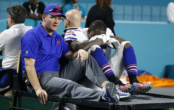 Buffalo Bills running back LeSean McCoy (25) is driven off the field after he was injured on a play during the second half against the Miami Dolphins on Sunday, Dec. 31, 2017, in Miami Gardens, Fla. (Wilfredo Lee/AP)