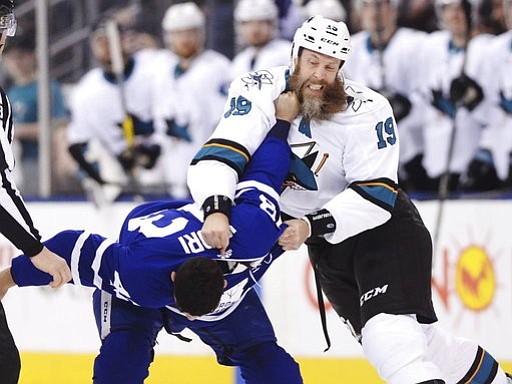 San Jose Sharks’ Joe Thornton, right, fights with Toronto Maple Leafs’ Nazem Kadri during the first period of an NHL hockey game Thursday, Jan. 4, 2018, in Toronto. (Frank Gunn/The Canadian Press via AP)
