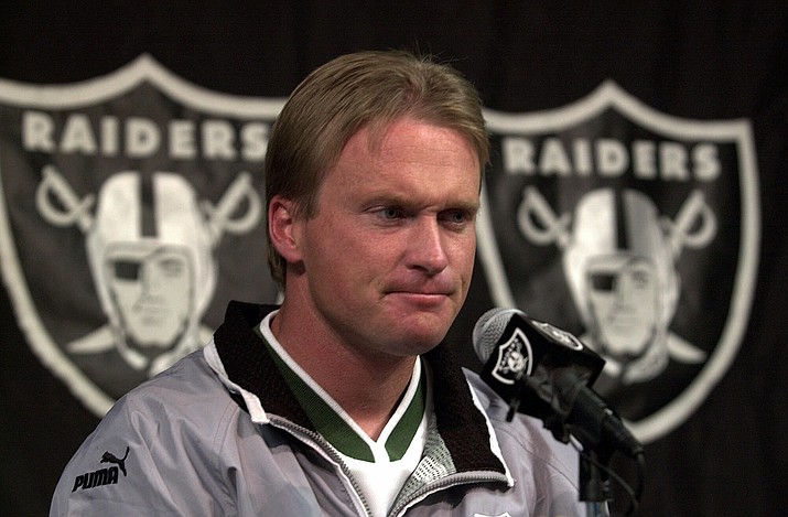 In this Jan. 14, 2001, file photo, then-Oakland Raiders’ coach Jon Gruden is shown during a press conference at Raiders headquarters in Alameda, Calif. The Raiders are set to bring Jon Gruden back for a second stint as coach. (Ben Margot/AP, File)