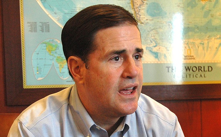 Gov. Doug Ducey: “I’m not raising taxes ... Our economy is growing ... Our state government is being operated more effectively and efficiently.’’ (Photo by HowardFischer, Capitol Media Services)