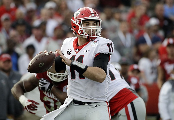 Georgia quarterback Jake Fromm throws a pass during the Rose Bowl NCAA college football game against Oklahoma. Georgia plays Alabama in the Monday, Jan. 8, 2018, College Football national championship game. (Jae C. Hong, AP file)