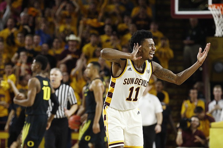 Arizona State guard Shannon Evans II (11) celebrates with the cheering crowd after a making basket against Oregon during the first half Thursday, Jan. 11, 2018, in Tempe. (Ross D. Franklin/AP)