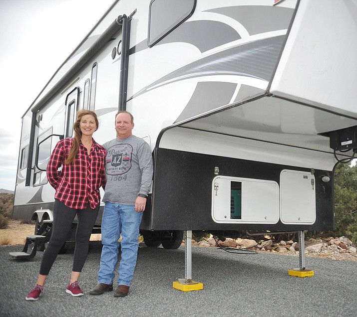 Mark Van Deusen and his wife, Patti, who plan to travel by fifth-wheel and plane now that he has retired from Quality Collision in Prescott Valley. (Les Stukenberg/Courier)