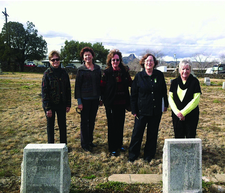 Members of the Prescott Pines Questers pose for a photo at the Draper plot. 