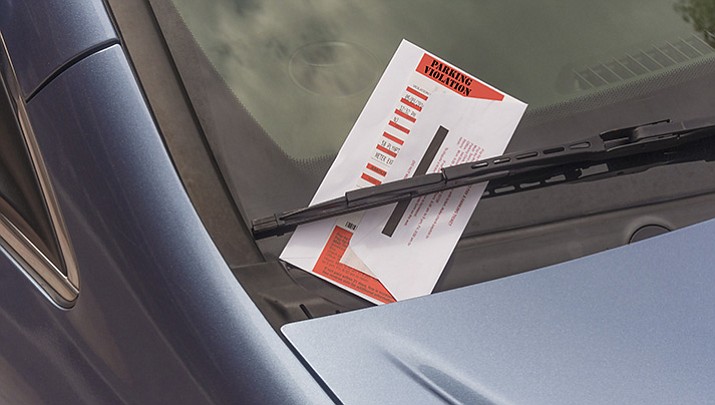 Four Salt Lake City parking enforcement officers have been fired for accepting free pizza from a downtown pizzeria in exchange for not writing parking tickets for the owner and his employees. (Stock art)