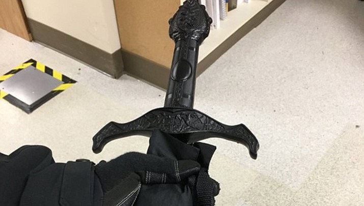 This photo provided by the Kirkland Police Department shows an umbrella with a sword-shaped handle on Wednesday, Jan. 17, 2018 in Kirkland, Wash. A Seattle-area hospital was briefly placed in lockdown after a witness reported a man carrying what appeared to be a rifle, which turned out to be the umbrella. (Kirkland Police Department via AP)

