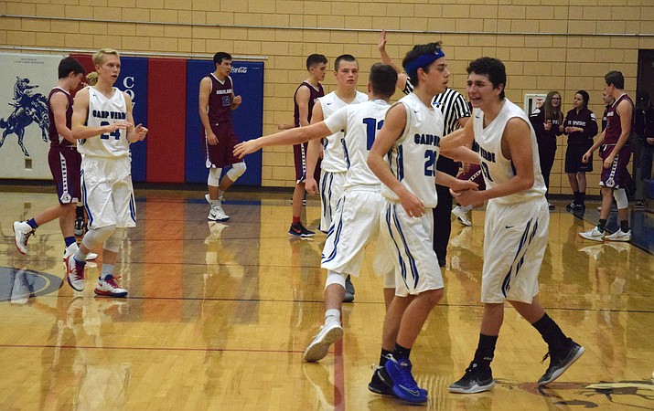 Camp Verde celebrates their 55-52 win over Northland Prep on Tuesday at home. (VVN/James Kelley)