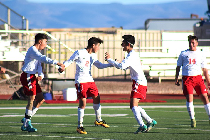 Mingus Union celebrates sophomore Eduardo Lazar’s game winning goal against Prescott on Saturday at home. (VVN/James Kelley)