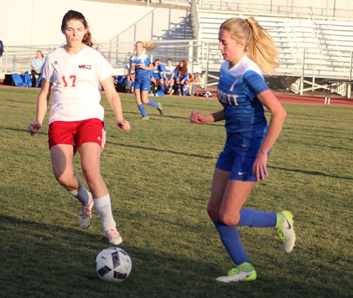 Prescott's Lily Jensen dribbles up the field as the Badgers play Lee Williams on Thursday, Jan. 18, 2018, in Kingman. Jensen scored four goals, added two assists and the Badgers won 10-1. (Beau Bearden/KDM)