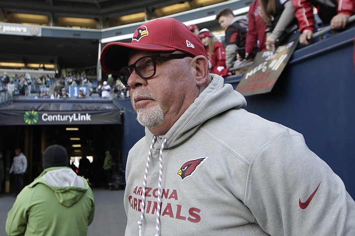 Former Arizona Cardinals head coach Bruce Arians looks out to the field before a game against the Seattle Seahawks on Sunday, Dec. 31, 2017, in Seattle. (John Froschauer/AP, File)