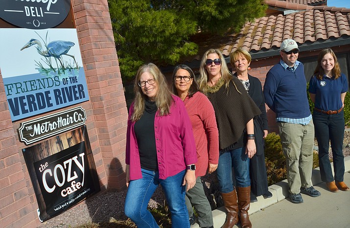 Nancy Steele, front in photo, the new executive director of the Friends of the Verde River, poses in front of the offices on Main Street in Cottonwood with some of her staff. (VVN/Vyto Starinskas)
