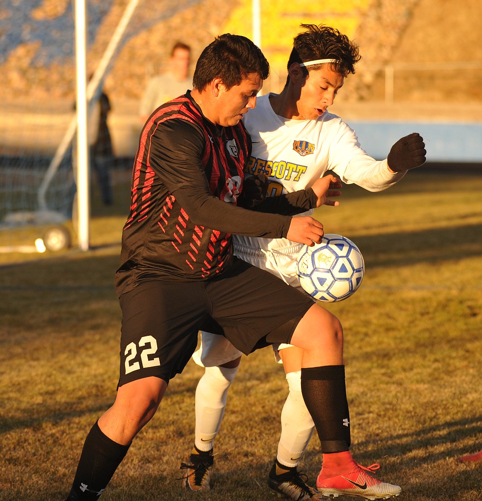 Bradshaw Mountain's Geronimo Sotelo and Prescott's Carlos Rivera as the Bears traveled to cross town rival Prescott in a soccer double header Tuesday. (Les Stukenberg/Courier)