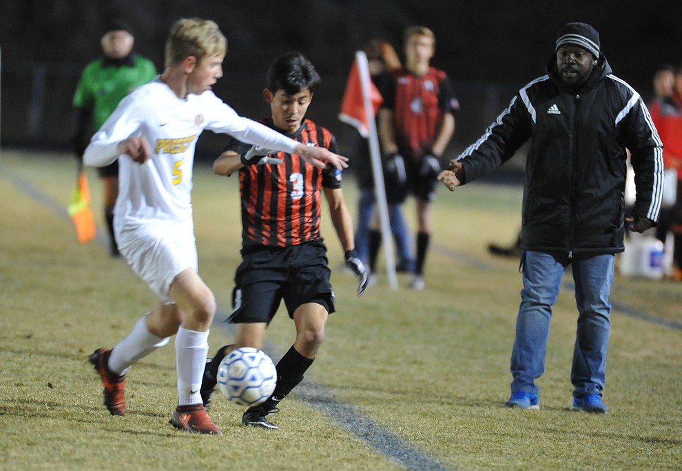 Bradshaw Mountain's Alan Pulido drives the ball along the sidelines as the Bears traveled to cross town rival Prescott in a soccer double header Tuesday. (Les Stukenberg/Courier)