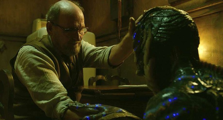 This image released by Fox Searchlight Pictures shows Richard Jenkins, left, and Doug Jones in a scene from the film "The Shape of Water." Jenkins was nominated for an Oscar for best supporting actor on Tuesday, Jan. 23, 2018. The 90th Oscars will air live on ABC on Sunday, March 4. (Fox Searchlight Pictures via AP)