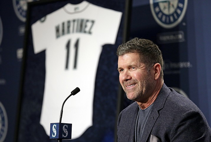 In this Jan. 24, 2017, file photo, Seattle Mariners former designated hitter Edgar Martinez smiles as he speaks at a news conference announcing the retirement by the team of his jersey number 11, in Seattle. Martinez is rocketing up the Hall of Fame ballot, boosted 13 years after his final swing by new-age statistical analyses and campaigning. (Elaine Thompson/AP, File)