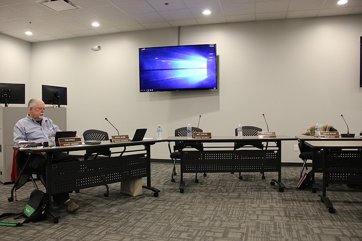 Central Yavapai Fire District board member Tom Steele sits by himself in the Central Yavapai Fire and Medical Authority’s conference room. Steele excused himself from the board’s executive session meeting because he was not permitted to record the conversation on his own personal recording device. 
