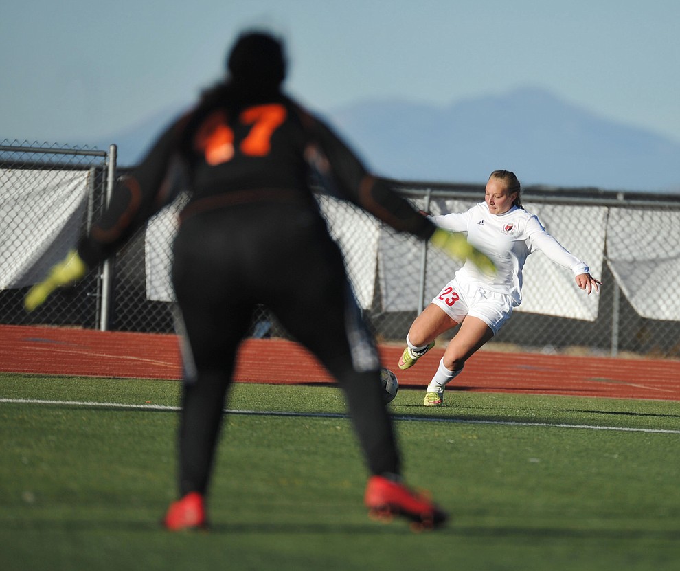 Bradshaw Mountain's Marissa Archer takes a shot on goal as the Bears take on Palo Verde Magnet Thursday in the Arizona Athletic Association's play-in round for the State Soccer Tournament that begins on Tuesday. (Les Stukenberg/Courier)