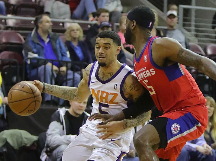 Northern Arizona’s Josh Gray (5) dribbles past an Agua Caliente defender Friday, Jan. 26, 2018, in Prescott Valley. Gray led the Suns with a career-high 32 points in a 131-110 win over the Clippers. (Matt Hinshaw/NAZ Suns)