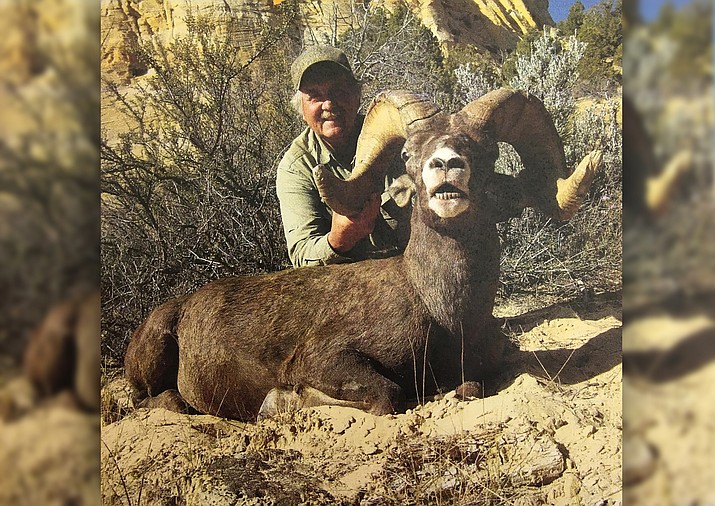 Larry Altimus poses with the desert bighorn ram he killed illegally in southwestern Utah. Altimus paid a high price for the hunting violation. The prominent Arizona guide is banned from hunting in 47 states for the next 10 years and paid more than $30,000 in restitution and fines. (Utah Division of Wildlife Resources)